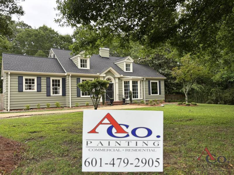 Residential exterior repaint of a ranch-style home in Mississippi