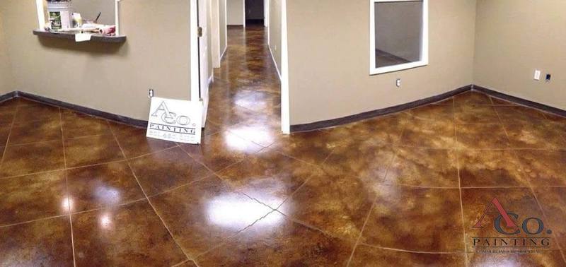 Stained and sealed concrete floor with a specialty finish by ACo. Painting